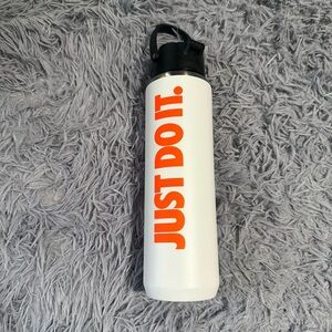 Nike 24oz White Water Bottle with orange text